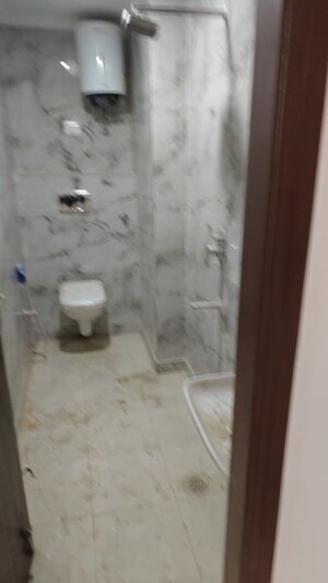 Bathroom in 2 BHK Builder Floor at Chattarpur – for Sale