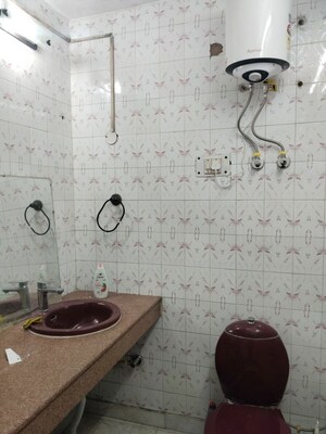 Bathroom in 3 BHK Builder Floor at Kalkaji – for Rent
