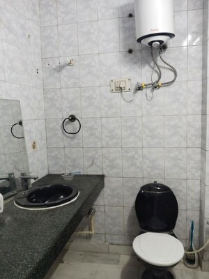 Bathroom in 3 BHK Builder Floor at Kalkaji – for Rent