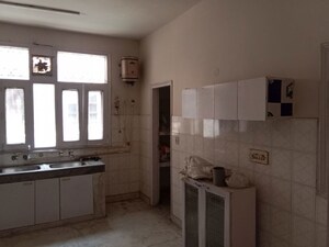 Kitchen in 4 BHK Builder Floor at Kailash Colony – for Rent
