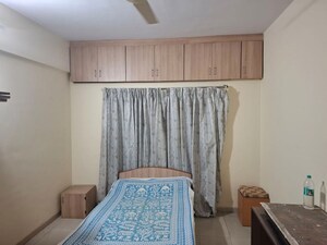 Bedroom in 2 BHK Apartment at Satyam Shivam Society, Wakad – for Rent