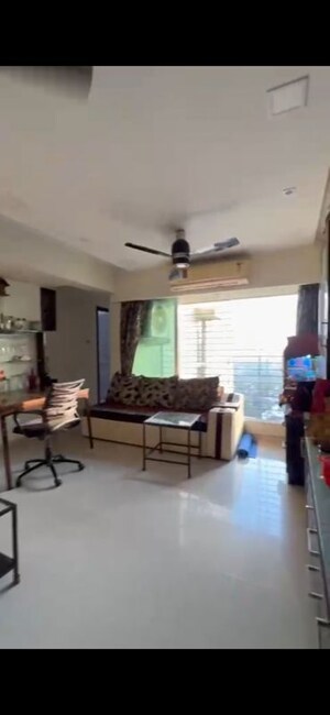 Living Room in 2.5 BHK Apartment at DLH Orchid, Andheri West – for Rent
