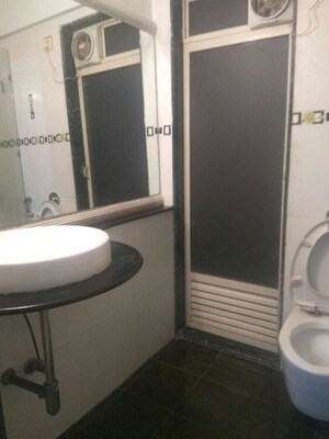 Bathroom in 2 BHK Apartment at Zinnia CHS, Powai – for Rent