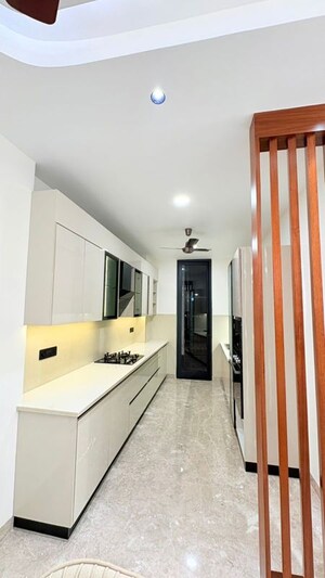 Kitchen in 3 BHK Builder Floor at Ansal API Esencia, Sector 67 – for Sale