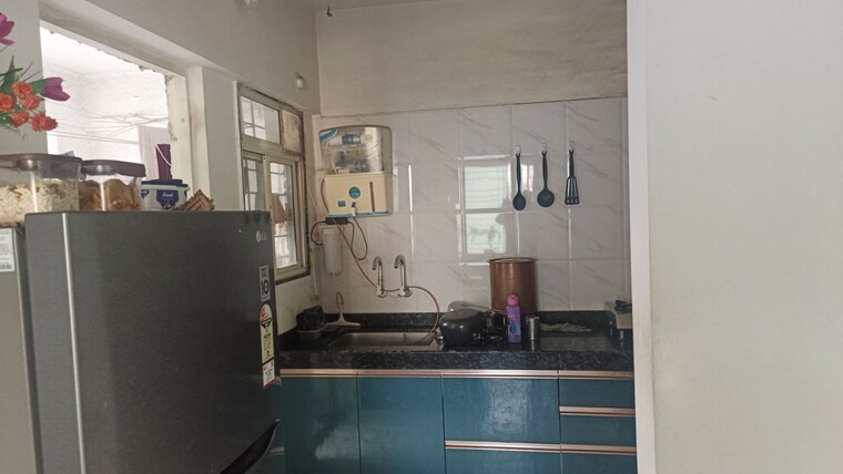 Kitchen, ishwar-parmar-river-residency 2 Bedroom 703 Sq.Ft. Apartment In Chikhali Pune 10520464