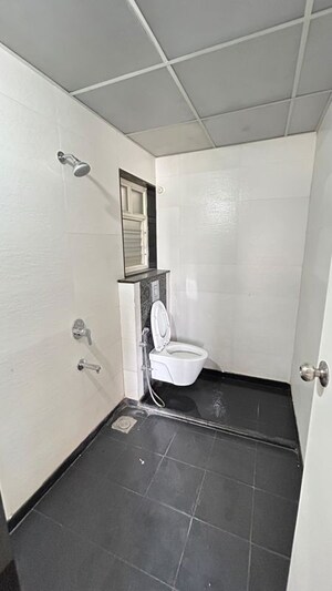 Bathroom in 2 BHK Apartment at Ganga Arcadia, Kharadi – for Rent