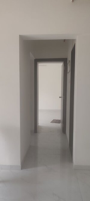 Building Lobby in 1 BHK Apartment at Anant Metropolis Insignia Towers, Kasarvadavali – for Rent