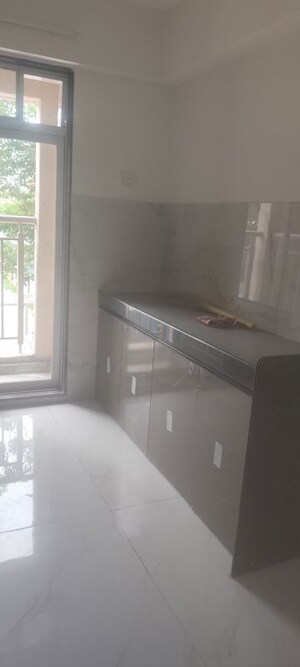 Kitchen in 1 BHK Apartment at Anant Metropolis Insignia Towers, Kasarvadavali – for Rent