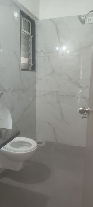 Bathroom in 1 BHK Apartment at Anant Metropolis Insignia Towers, Kasarvadavali – for Rent