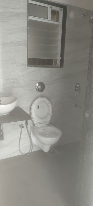 Bathroom in 1 BHK Apartment at Anant Metropolis Insignia Towers, Kasarvadavali – for Rent