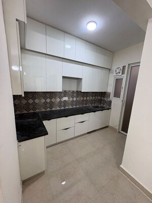Kitchen in 2 BHK Apartment at Signature The Millennia 3, Sector 37d – for Rent