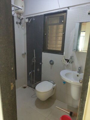 Bathroom in 2 BHK Apartment at Acme Ozone, Manpada – for Rent