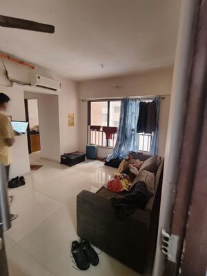 Living Room in 1 BHK Apartment at Crystal Armus, Chembur – for Rent