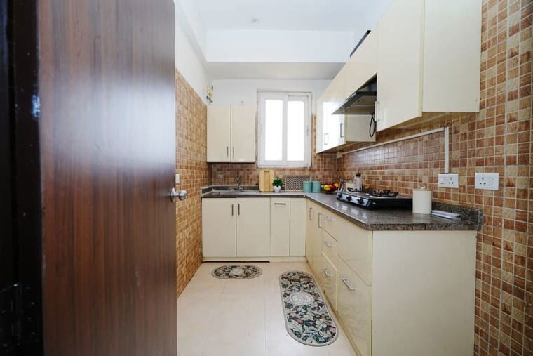Kitchen, umang-winter-hills 3 Bedroom 1616 Sq.Ft. Apartment In Sector 77 Gurgaon 10520709