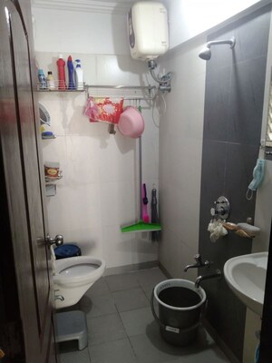 Bathroom in 1 BHK Apartment at Cosmos Orchid, Ghodbunder Road – for Sale