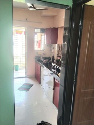 Kitchen in 1 BHK Apartment at Cosmos Orchid, Ghodbunder Road – for Sale