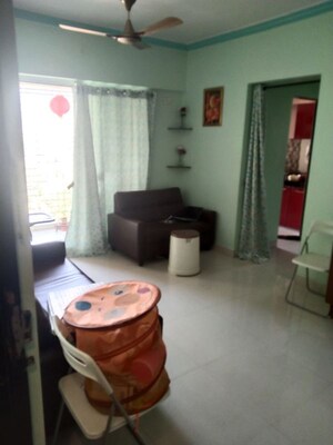 Living Room in 1 BHK Apartment at Cosmos Orchid, Ghodbunder Road – for Sale