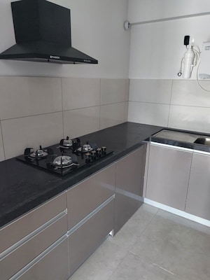 Kitchen in 2 BHK Apartment at Gera World of Joy, Kharadi – for Rent