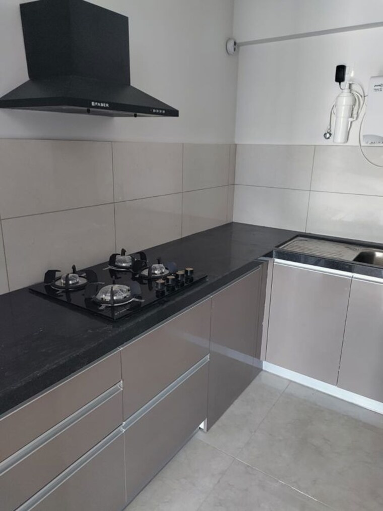 Kitchen, gera-world-of-joy 2 Bedroom 810 Sq.Ft. Apartment In Kharadi Pune 10520846