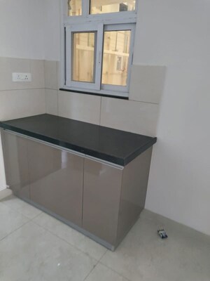 Kitchen in 2 BHK Apartment at Gera World of Joy, Kharadi – for Rent