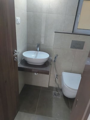 Bathroom in 2 BHK Apartment at Gera World of Joy, Kharadi – for Rent