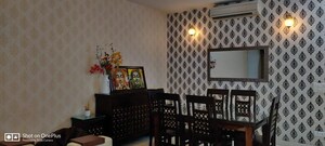 Living Room in 3 BHK Apartment at Emaar The Palm Drive-Palm Studios, Sector 66 – for Rent