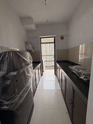 Kitchen in 1 BHK Apartment at Lodha Palava City Lakeshore Greens, Dombivli East – for Rent