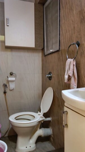 Bathroom in 2 BHK Apartment at Shri Balaji Ashirwad, Malad West – for Rent
