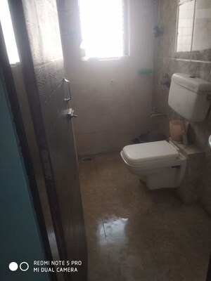 Bathroom in 1 BHK Apartment at Raunak Heights, Ghodbunder Road – for Sale