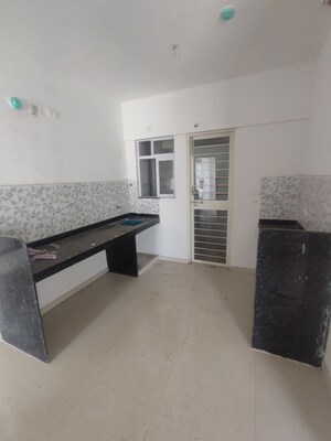 Kitchen in 3 BHK Apartment at Goel Ganga Altus, Kharadi – for Sale