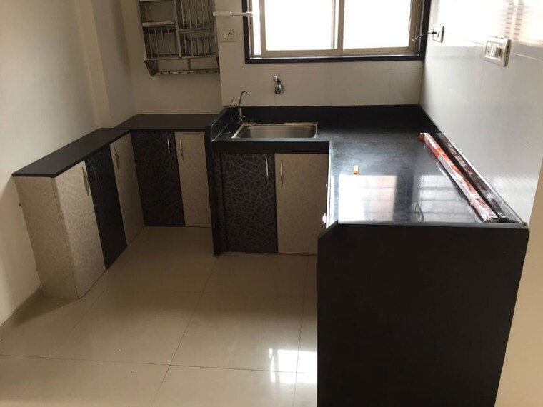 Kitchen, lavender-apartment 1 Bedroom 585 Sq.Ft. Apartment In Kharadi Pune 10521048