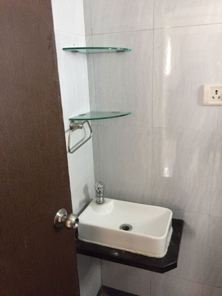 Bathroom, lavender-apartment 1 Bedroom 585 Sq.Ft. Apartment In Kharadi Pune 10521048