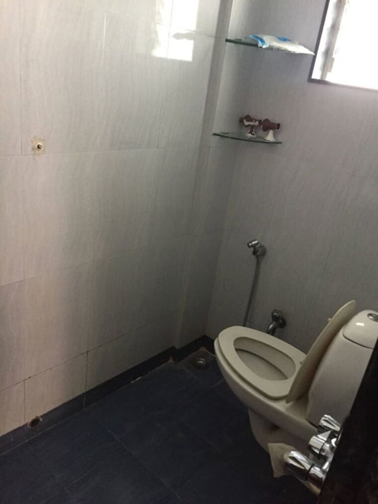 Bathroom, lavender-apartment 1 Bedroom 585 Sq.Ft. Apartment In Kharadi Pune 10521048