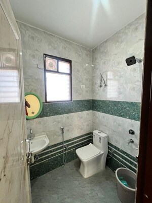 Bathroom in 3 BHK Apartment at Freedom Fighters Enclave – for Rent