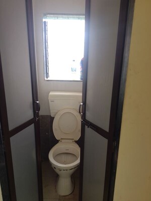 Bathroom in 1 BHK Apartment at Omkar Apartment Kharegaon, Kalwa – for Rent