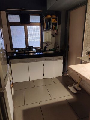 Kitchen in 1 BHK Apartment at Guru Mauli Apartments, Andheri West – for Sale