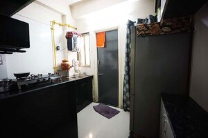 Kitchen in 2 BHK Apartment at Nava Naroda – for Sale