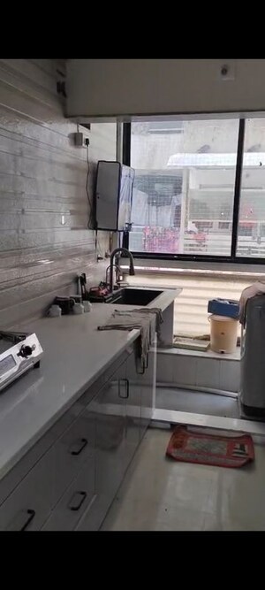 Kitchen in 2 BHK Apartment at Sangath Nano, Motera – for Rent