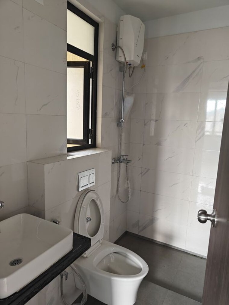 Bathroom, risland-the-icon 2 Bedroom 600 Sq.Ft. Apartment In Dhokali Thane 10521499