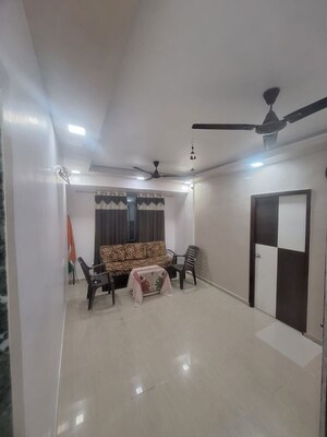 Living Room in 2 BHK Apartment at Cbd Belapur Sector 15 – for Rent