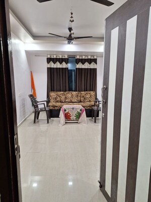 Living Room in 2 BHK Apartment at Cbd Belapur Sector 15 – for Rent