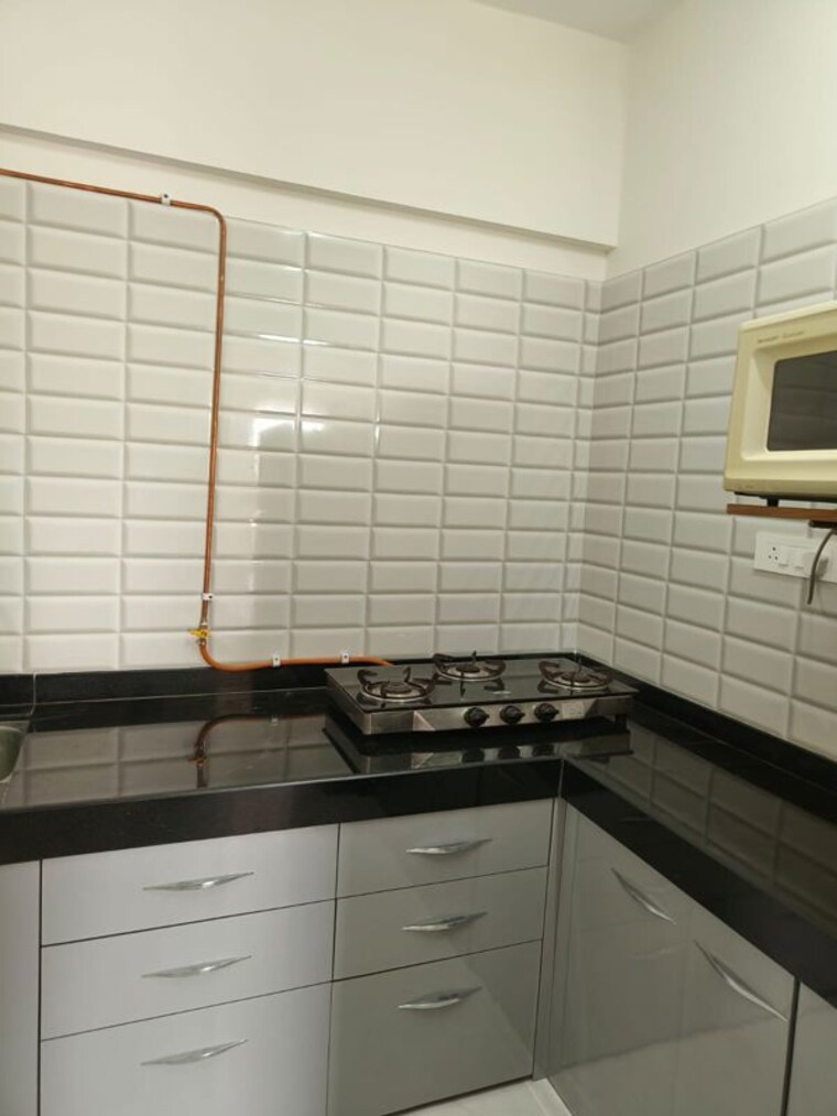 Kitchen, nyati-exuberance-1 2 Bedroom 930 Sq.Ft. Apartment In Undri Pune 10521719
