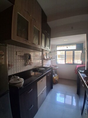 Kitchen in 2 BHK Apartment at Mahavir Heritage CHS, Kharghar Sector 35g – for Rent
