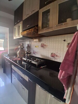 Kitchen in 2 BHK Apartment at Mahavir Heritage CHS, Kharghar Sector 35g – for Rent