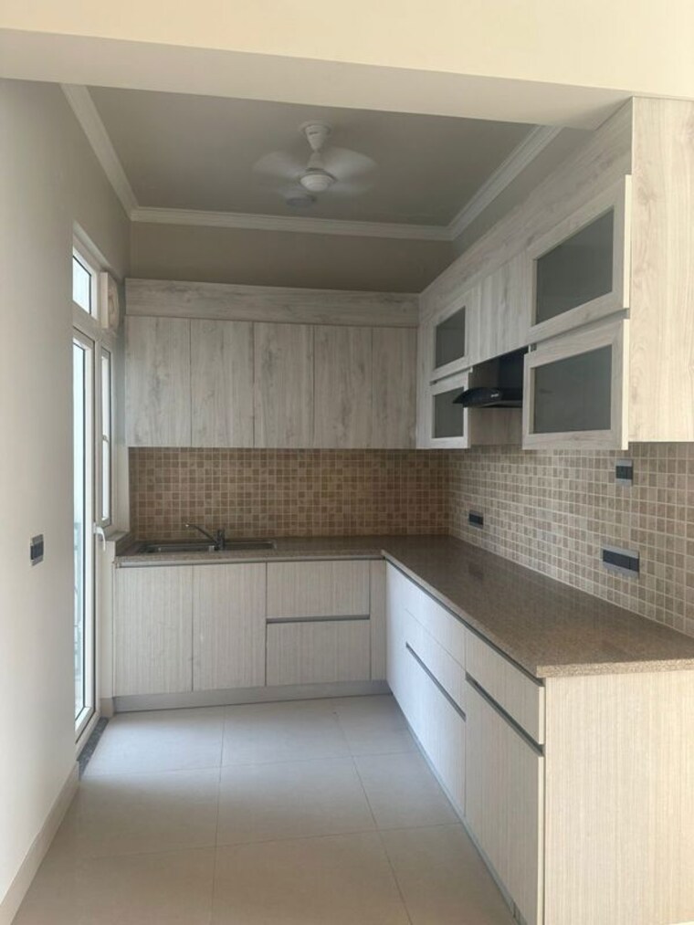 Kitchen, central-park-flower-valley 2.5 Bedroom 1093 Sq.Ft. Builder Floor In Sohna Sector 33 Gurgaon 10521867