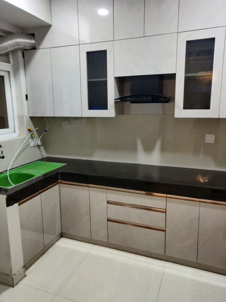 Kitchen, eldeco-live-by-the-greens 3 Bedroom 1404 Sq.Ft. Apartment In Sector 150 Noida 10521929