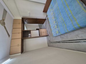 Room in 2 BHK Apartment at N G Garden, Kandivali West – for Rent