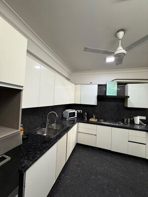 Kitchen in 4 BHK Apartment at Greater Kailash I – for Sale