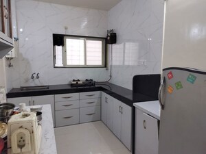 Kitchen in 2.5 BHK Apartment at Yash Sankul, Pimple Saudagar – for Rent