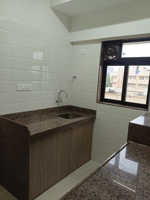 Kitchen in 2 BHK Apartment at Chandiwala Pearl Heaven, Andheri East – for Rent